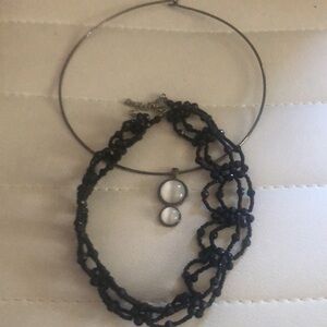 Necklaces 2 chocker type necklaces1 black beaded and one with pendant